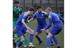 Barnoldswick (blue) couldn't hold on for three points against Ramsbottom