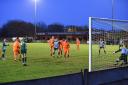 Freddie Westfall (centre) turns home Steeton's equaliser just after the hour mark, to the despair of their tangerine-shirted hosts.
