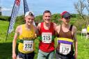Ben Rothery (middle) with the 2nd and 3rd placed runners after Pendle Cloughs
