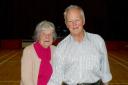 Margaret Harper and Robert Rushton cut a cake celebrating 60 years of Scottish dancing in Ingleton