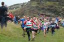 Keighley & Craven Juniors lead the way in a junior race at the Withins Skyline fell race near Haworth  Picture: Dave Woodhead
