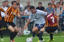 Danny Forrest in action for Guiseley in a pre-season friendly against Bradford City