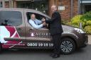 Acorn Stairlifts company secretary Dave Belmont, right, presents the keys for the new vehicle to Dave Rice, facilities manager at the hospice