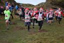 Juniors get into festive mood dressed in Santa hats in The Stoop fell race on Haworth Moor  Picture: Dave Woodhead