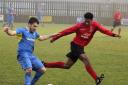 Barnoldswick Town's Zack Dale takes on Irlam's Joel Amado Picture: Pete Naylor