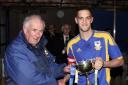 Barnoldswick captain Aidan McCusker receiving the Morrison Cup Picture: Pete Naylor