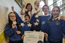 Pupils celebrate getting their Gold award