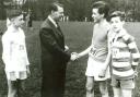 Roger Ingham winning the senior race in 1961 being congratulated by the then headmaster of Ermysted's Jack Eastwood