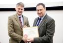 CCM’s Kyle Hawksworth, left, receives his LAA diploma from chairman Alistair Brown.
