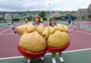 Jill Berry and Jan Abberton try out sumo tennis