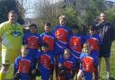 Cowling under-11s show off their new kit, sponsored by Tip Top Tasters