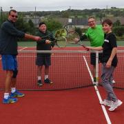 Jonathan Crossley, left, and Joel Griffiths finish with a match against a father-and-son team