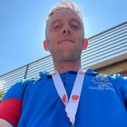 Danny Foster (Captain) poses with his winner's medal
