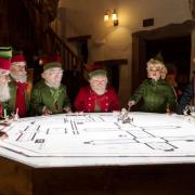 Santa maps out his route at the Cruck Barn, Appletreewick