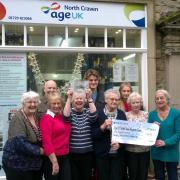 Some of the 180 volunteers with Age UK North Craven: Margaret, Joan, Michael, Pauline, Herbie, Violet, Lisa, Alanah, and Jean