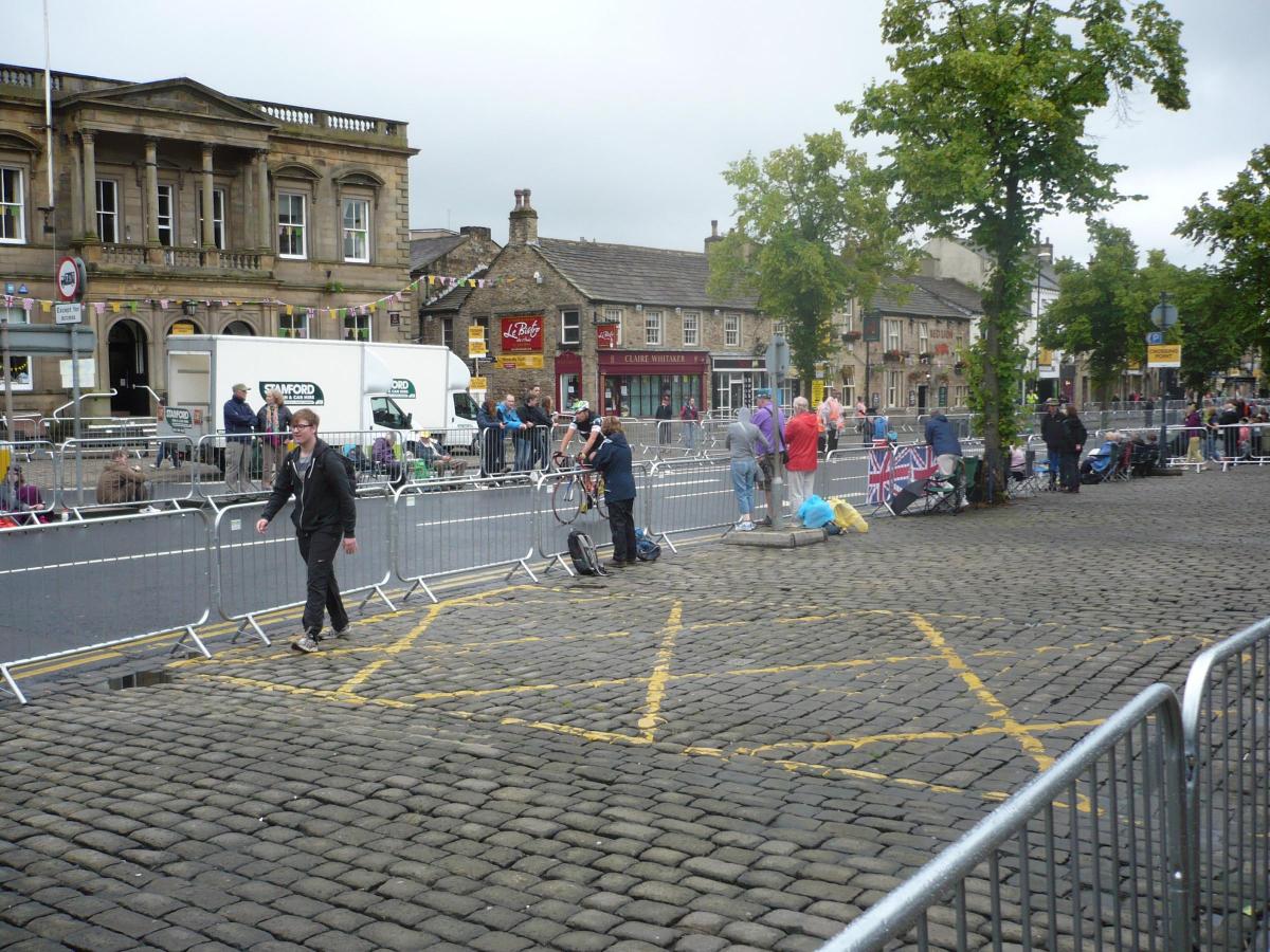 Early arrivals finding their viewing spot on Skipton's High Street hours ahead of the Tour's arrival