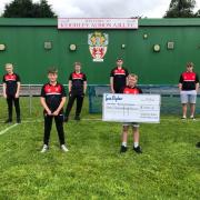 Keighley Albion with a cheque for Sue Ryder - Manorlands Hospice