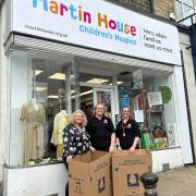 Andrina Reynoldson (left), manager of the Martin House Skipton shop, with Emily Shepherd (centre) and Rebecca Haworth from Acorn Stairlifts.