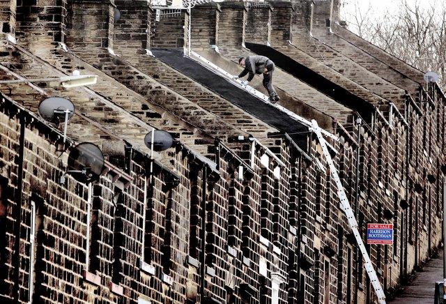 This is one job where you definitely need a head for heights. Photographer Stephen Garnett was passing Upper Sackville Street in Skipton when he spotted this roofer at work on one of the terraced houses among the steep streets of Middletown