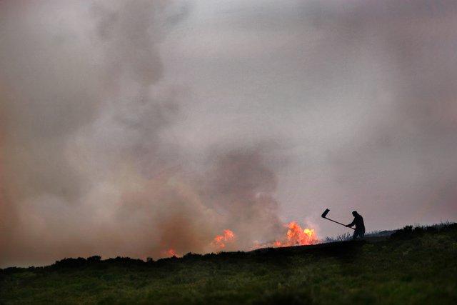 Controlled heather burning on the moor above Lothersdale.
