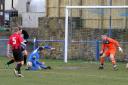 Former Barnoldswick Town man Ben Gorman (blue) scored twice in Trawden Celtic Juniors' 3-2 win over Grassington United. Picture: Peter Naylor.