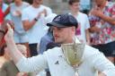 Settle skipper Will Davidson with the Ribblesdale League Cup