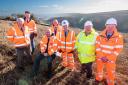 Roads Minister Richard Holden, seated, at Kex Gill with county council leader Carl Les, Cllr Keane Duncan, TfN's Darren Oldham,  Don Mackenzie, John Fort and Richard Binks