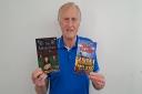 Brian Beresford with his books for children