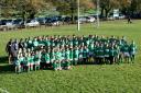 The photo shows Wharfedale's Mini and Junior section proudly wearing  their new rugby shirts