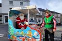 Santa David Blackburn and his elf helper, John Diggles, on the day of the lights switch-on