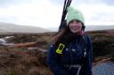 Tessa Levens on Cray Moss, beside just installed leaky dams, Wharfedale in the background.