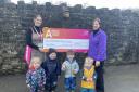 Laura Hepworth from Airedale receiving a cheque from the children at Chipmonks Nursery