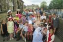 Sutton Community Primary School children, who were treated to garden parties of their own at their school last month