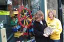 Sue Bye (right) from Otley Carnival Committee presenting the Overall Winner shield to Sue Devereaux of Courtyard Planters