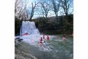 Wild swimmers brave Janet's Foss, near Malham, in New Year's Day 2024