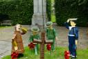 Flowerpot characters at Settle war memorial
