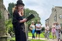 Sarah Lister keeping people spellbound during a graveyard trail this summer