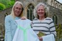 Jo, left, and Julie with the gown outside Linton church