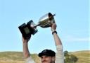 Will Davidson lifting the league title for Settle, but they couldn't quite add the T20 crown.