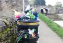 Overflowing bin on the canal towpath at Gargrave