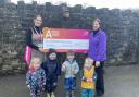 Laura Hepworth from Airedale receiving a cheque from the children at Chipmonks Nursery