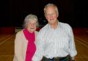 Margaret Harper and Robert Rushton cut a cake celebrating 60 years of Scottish dancing in Ingleton