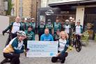 Skipton Cycling Club cheque to Manorlands. Picture Paula Solloway