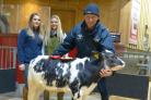 Judges Chloe and Chrissie Lund with Andrew Ayrton and his champion calf
