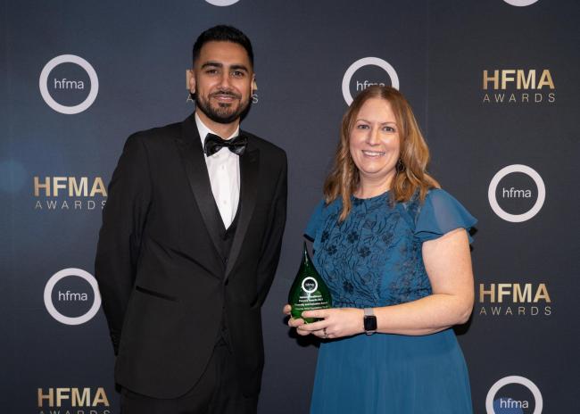 With the award are Airedale NHS Foundation Trust assistant director of finance Izaaz Mohammed and director of finance Amy Whitaker