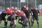 Skipton (red) battled to a 20-10 victory against Ossett (black) at the weekend