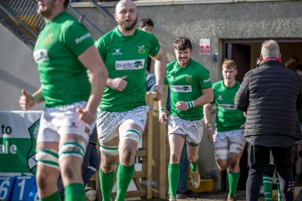 The Wharfedale team (green) enter the field ahead of their tie with Hull on Saturday. Pic: Wharfedale RUFC
