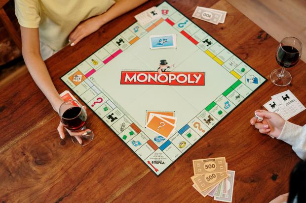 Craven Herald: Two people playing Monopoly (Canva)
