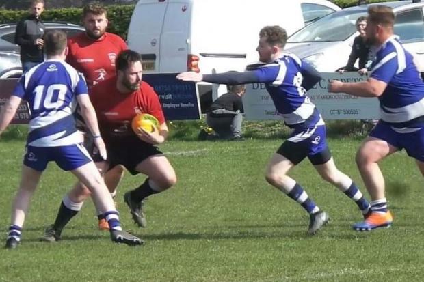 Chris Wright (red), playing his last match for Skipton