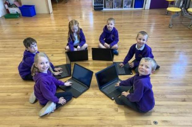 Carleton Primary School receives laptiops from Skipton Building Society
